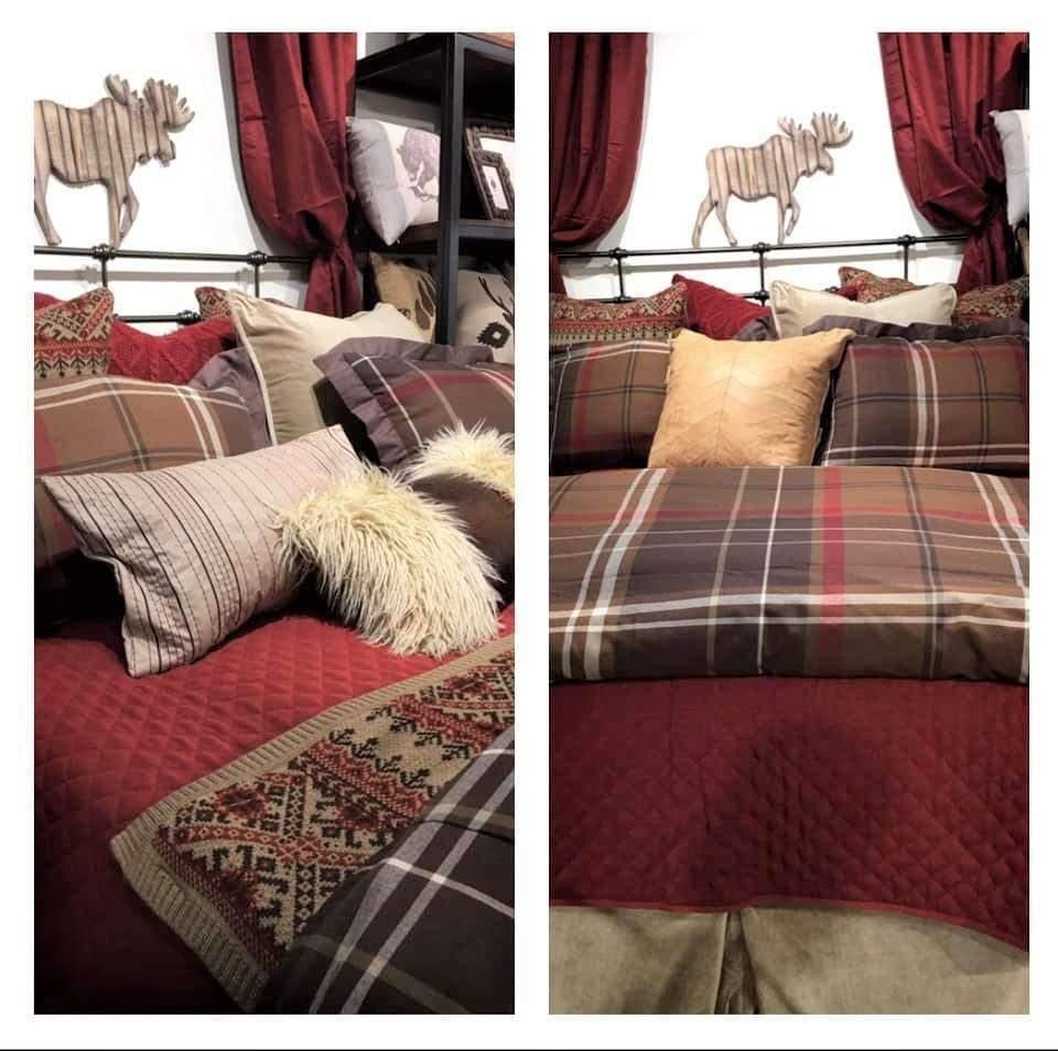Plaid and red lodge style bedding and accents layered