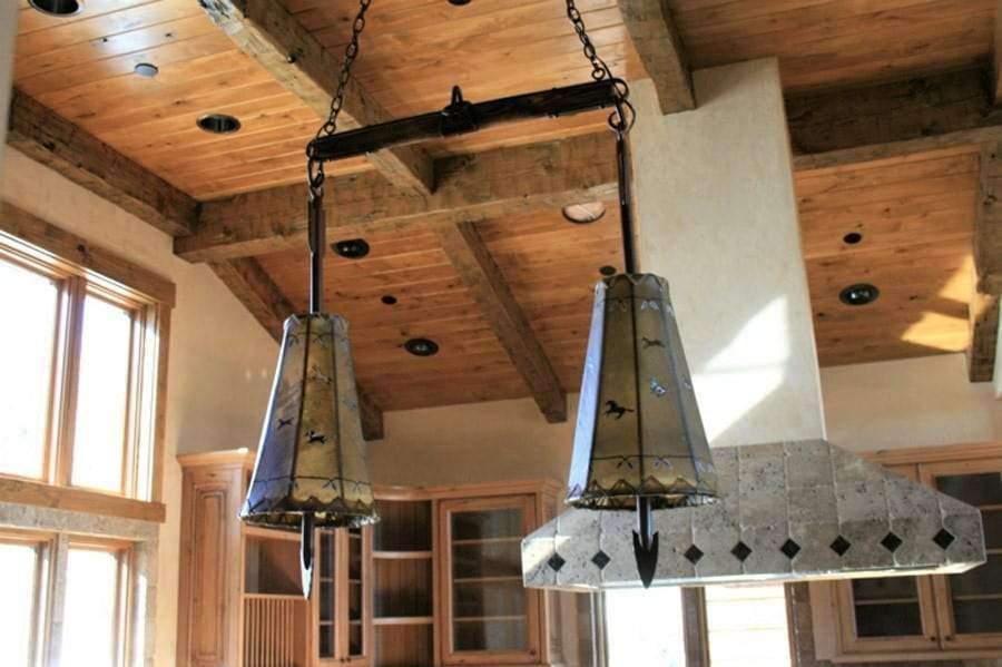 Fort Rock Painted Rawhide Pendant Lights w/ hand forged iron rods. Made in the USA