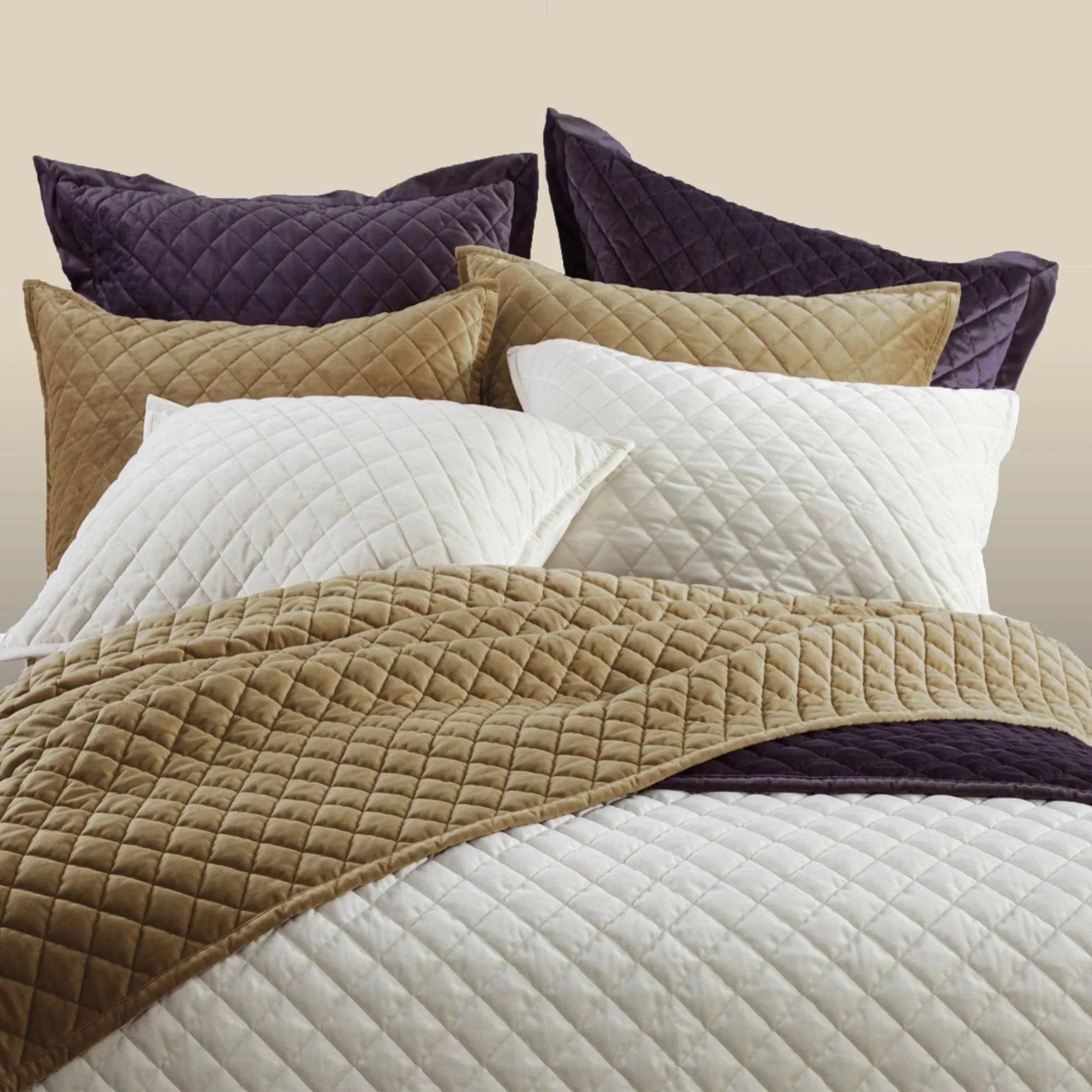 Velvet Diamond Quilted Euro Shams on a bed from HiEnd Accents