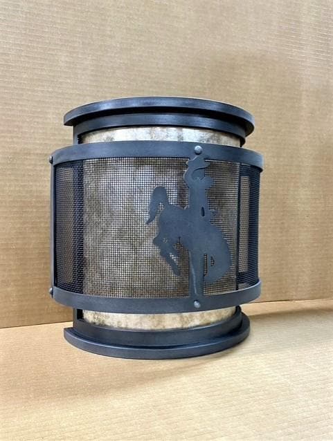 Wyoming bronc wall sconce with mica and steel mesh shade. Handmade in the USA. Your Western Decor