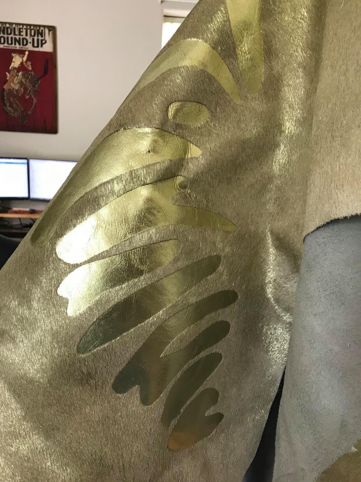 Gold stenciled zebra on beige cowhide rug - Your Western Décor & Design