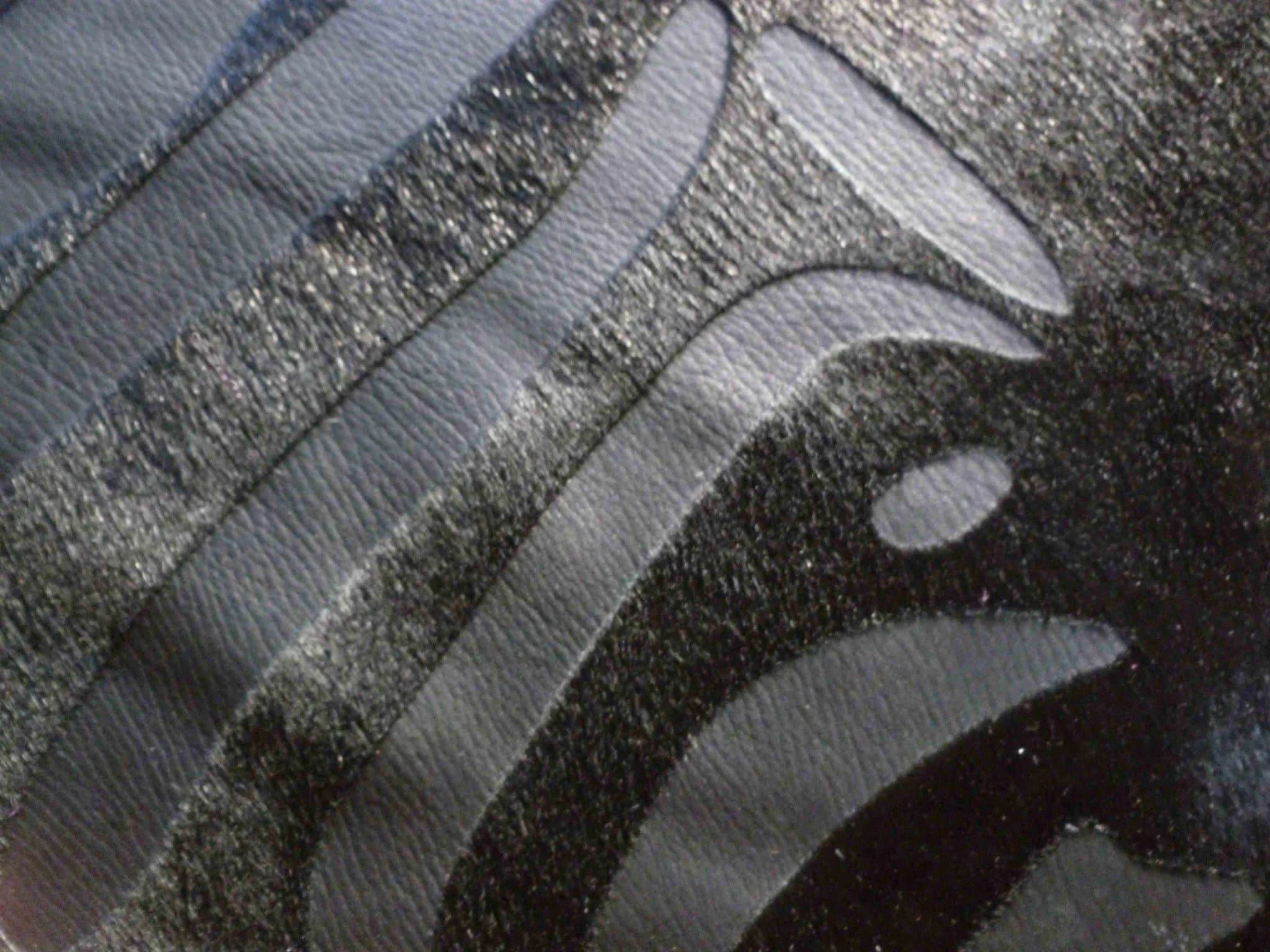 Zebra pattern laser etched into black cowhide rug. Free shipping. Your Western Decor