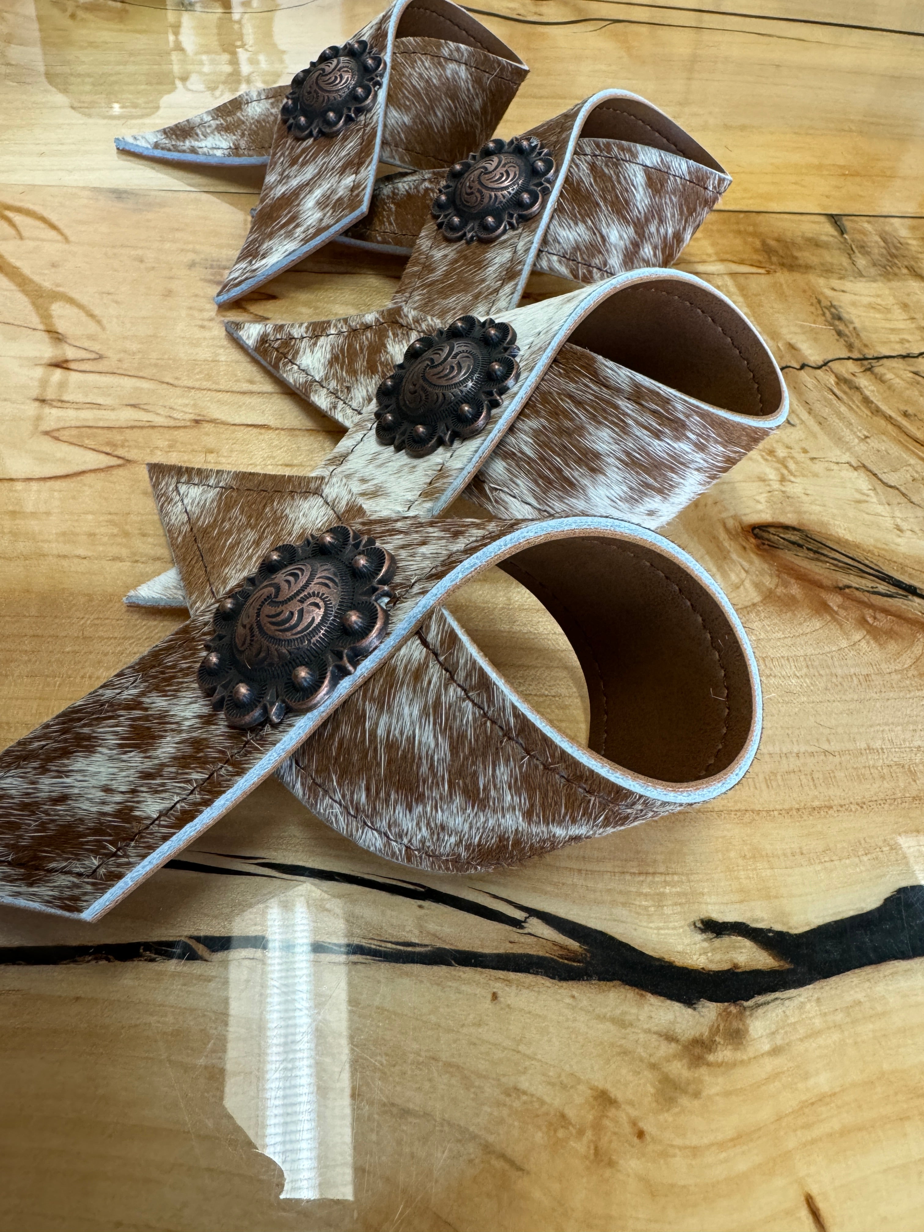 Peppered Cowhide Napkin Rings with conchos - Your Western Decor