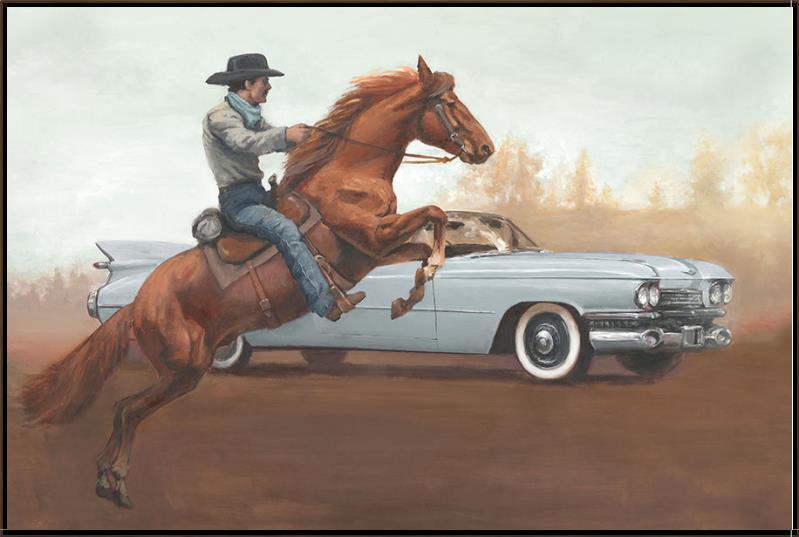 A western-themed art print depicting a cowboy riding a brown horse alongside a light blue classic car on a dusty road, framed in a dark walnut frame. Made in the USA