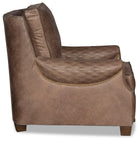 Brown leather armchair side showing quilted armrests - Your Western Decor