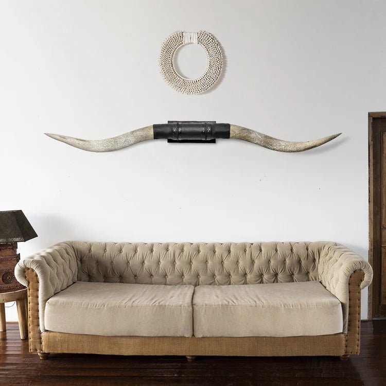 Atticus Carved Longhorns Mount XL above Chesterfield Sofa - Your Western Decor