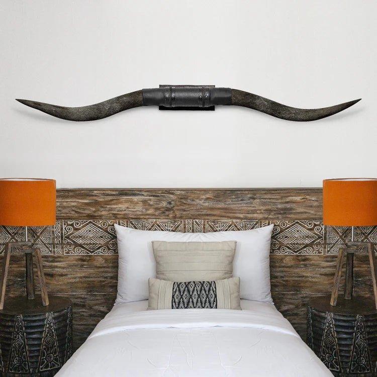 Black Stalker Carved Longhorn Mount above bed - Your Western Decor