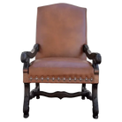 Brown leather armchair with wooden frame and studded details on a white background