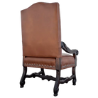 Brown leather armchair with dark wood legs on a white background