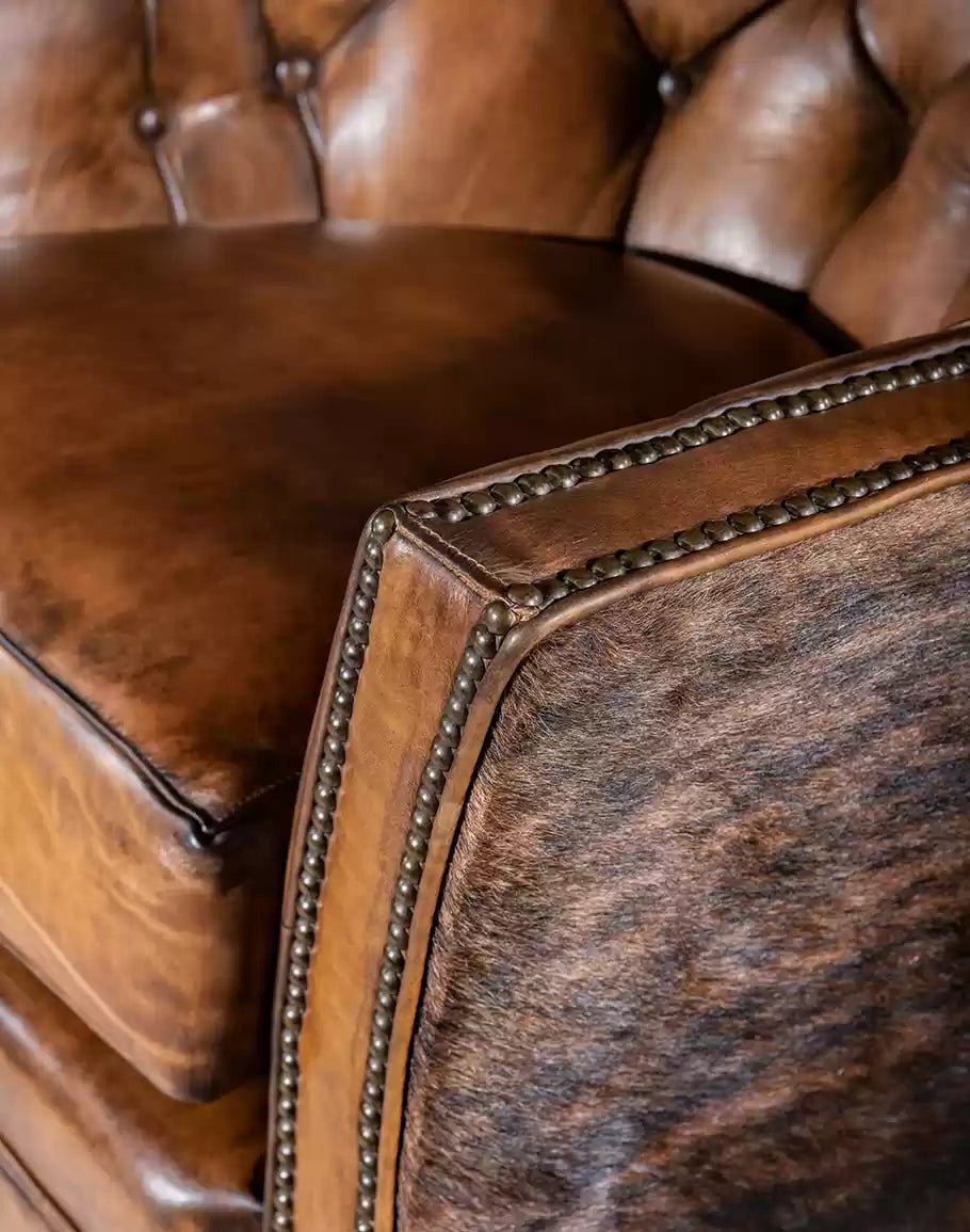 American made Brindle Cowhide & Tufted Leather Swivel Glider - Your Western Decor