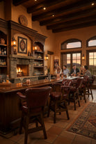 Bar with red burnished leather barstools - Your Western Decor