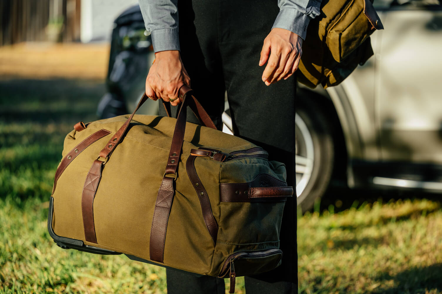 Waxed canvas and leather roll-on duffle bag made in the USA - Your Western Decor