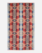 Pendleton Canyonlands Spa & Beach Towel featuring a vibrant Southwestern-inspired pattern in red, turquoise, navy, and ivory.