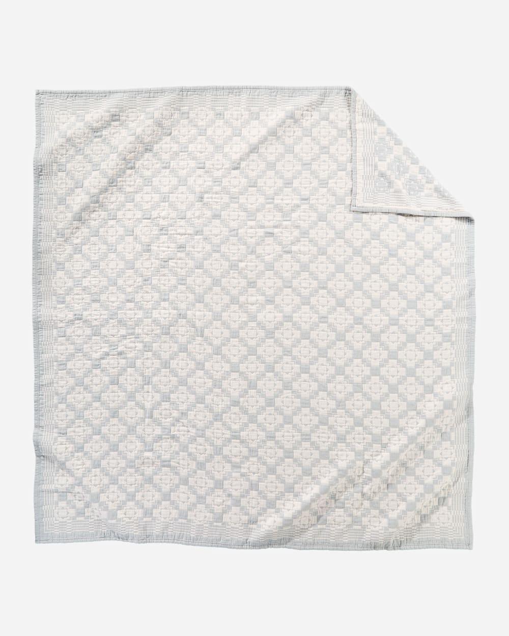 Light blue and white Chief Joseph quilt reverse