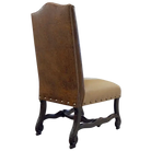 Brown leather chair with beige leather cushion and nail tacking detail