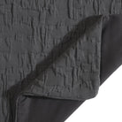 Textured gray fabric with a pattern on a white background