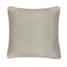 Textured beige pillow on a white background