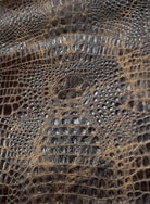 Gator distressed and embossed leather 