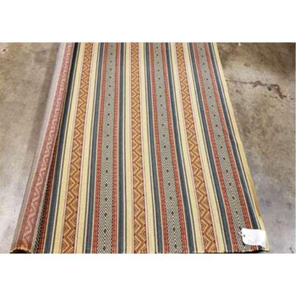 Striped fabric roll with geometric patterns on a concrete floor made in the USA - Your Western decor
