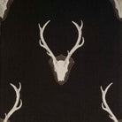 Uncle Buck staghorn upholstery fabric black background 
