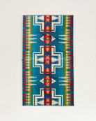 Pendleton Harding Spa & Beach Towel woven from premium cotton velour featuring the iconic Harding pattern in vibrant turquoise, navy, red, gold, and white.