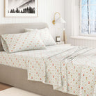 Christmas Floral patterned bedspread on a bed in a well-lit bedroom