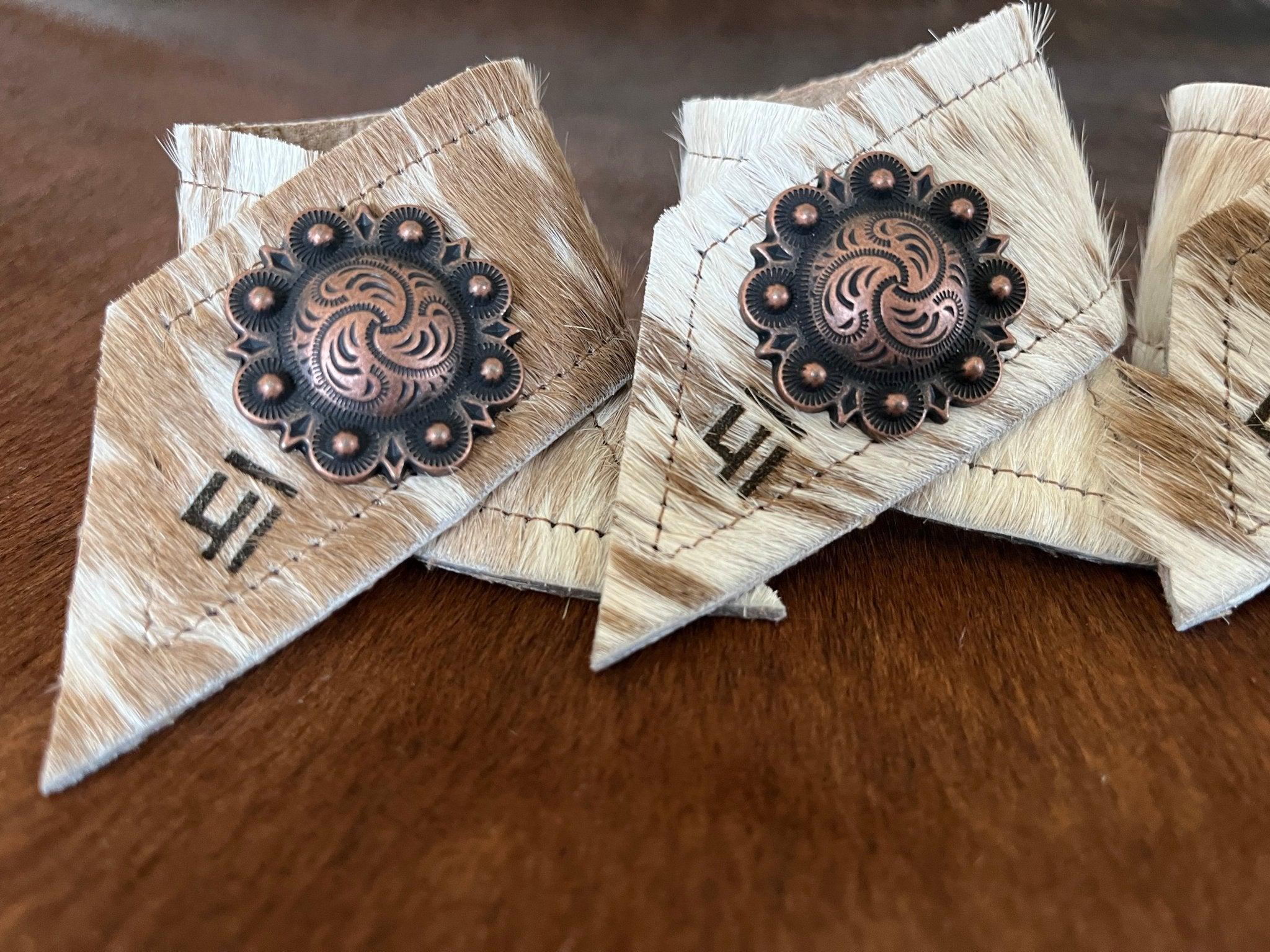 4-pc custom branded cowhide napkin rings with berry conchos - handmade in Oregon by Randee Mckague at Your Western Decor