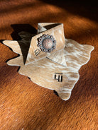 Custom branded cowhide coaster and napkin ring handmade by Randee McKague at Your Western Decor in Pilot Rock, Oregon