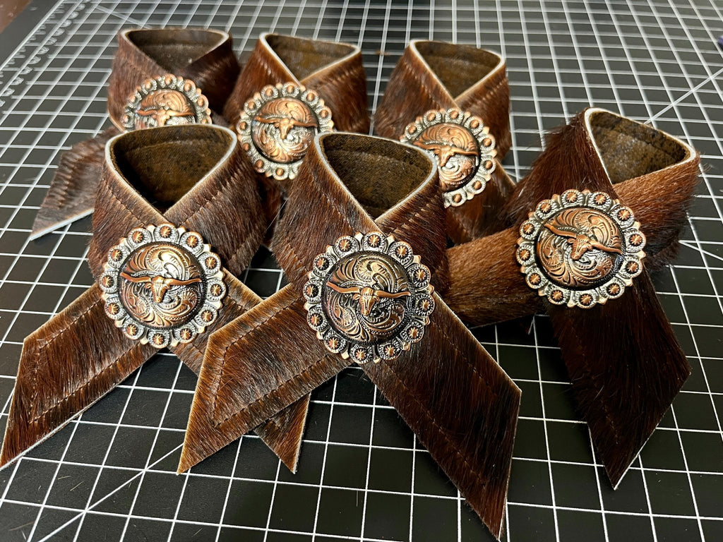 Cowhide and longhorn concho napkin rings handmade in the USA by Your Western Decor
