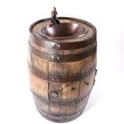 Rustic bathroom vanity made from whiskey barrel with copper sink and faucet - Your Western Decor