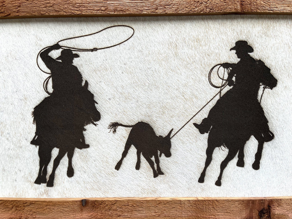 Laser burn team roping on cowhide western wall decor made in the USA - Your Western Decor