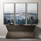 abstract pine forest landscape canvas wall art set in blue and neutral tones for modern rustic and designer interiors above console table