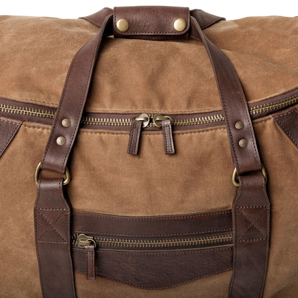 Waxed canvas and leather roll-on duffle bag made in the USA - Your Western Decor