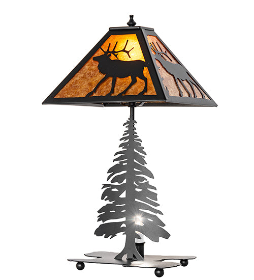 Lone elk table lamp illuminated with warm amber glow and elk silhouette design