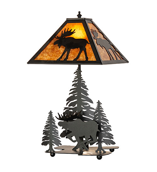 Lone moose table lamp glowing with warm amber mica shade and moose silhouette design