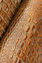 Close-up of brown crocodile leather texture