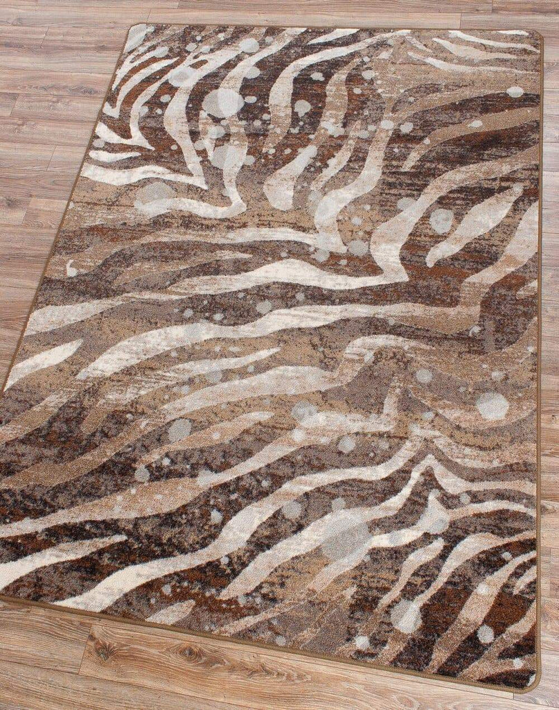 Silver metallic splash over zebra print. Rugs made in the USA. Your Western Decor