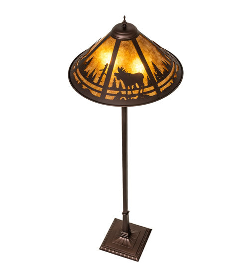 Close-up of Moose Creek floor lamp shade with glowing amber mica and moose woodland scene