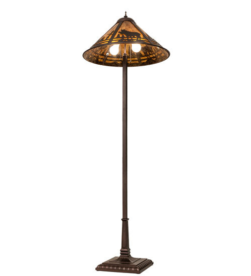 Moose Creek floor lamp illuminated showing amber mica shade underside with moose and forest silhouette detail