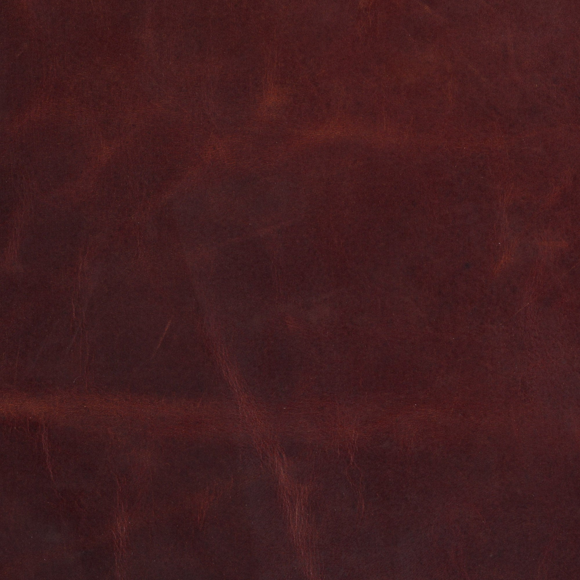 Old Havana Chipotle leather is a burgundy/brown rich pull-up leather 