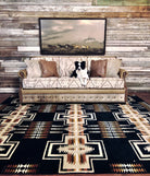 Mesa Southwestern sofa on Oxford Harding rug, horse art, and Border Collie laying on sofa