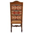 Wooden chair with patterned backrest on a white background