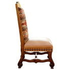 Decorative chair with patterned backrest and leather seat on a white background