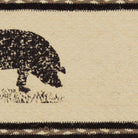 Textile jute oval stair tread with a black pig silhouette on a beige background - Your Western Decor