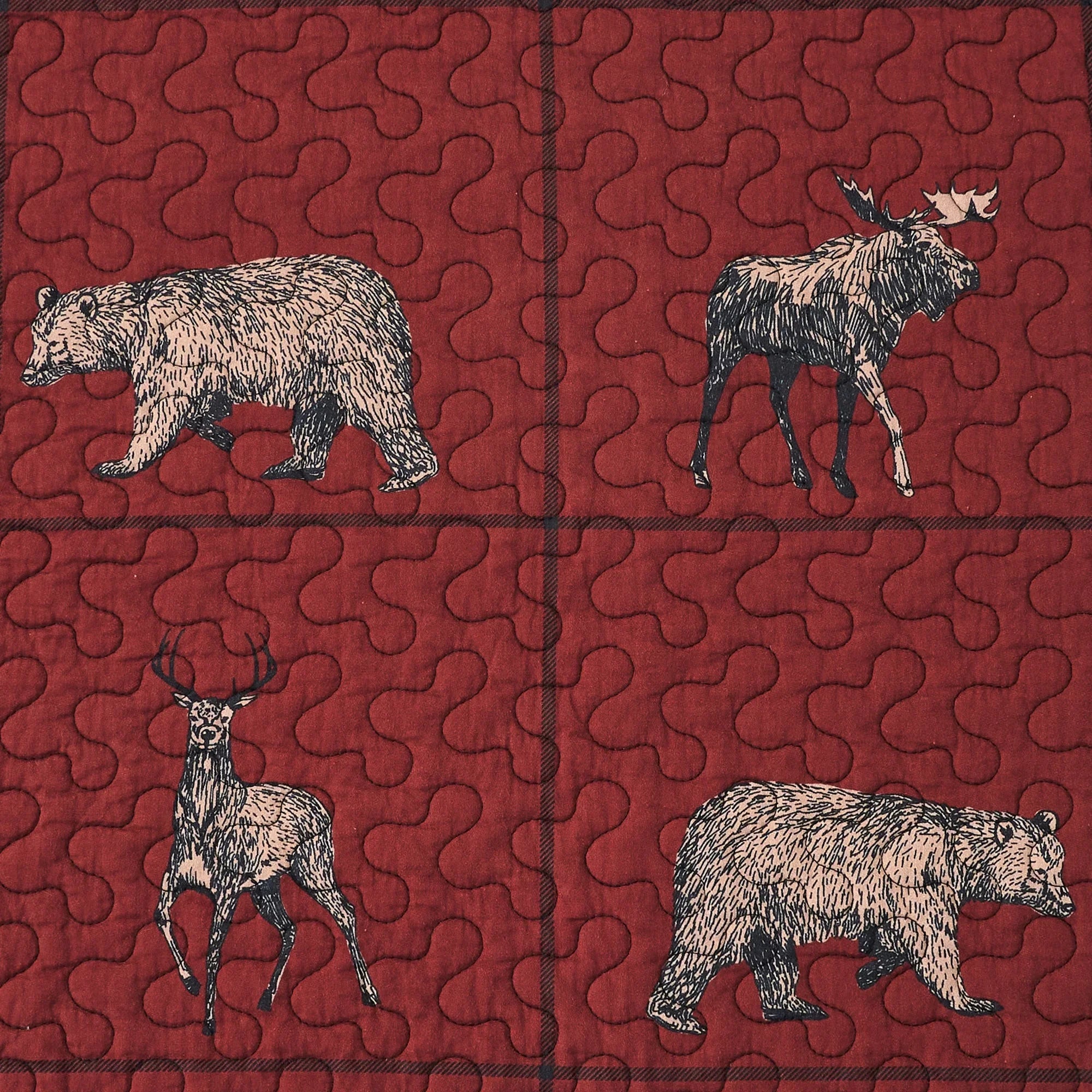 Pattern of bears and moose on a red fabric background