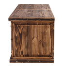 A rustic dark brown wooden office desk end with a paneled front door and metal corner accents, shown against a plain white background.