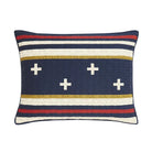 Decorative pillow with striped pattern and cross designs on a white background