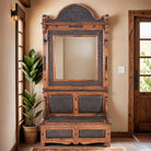 Rustic tooled leather entryway bench with mirror and storage