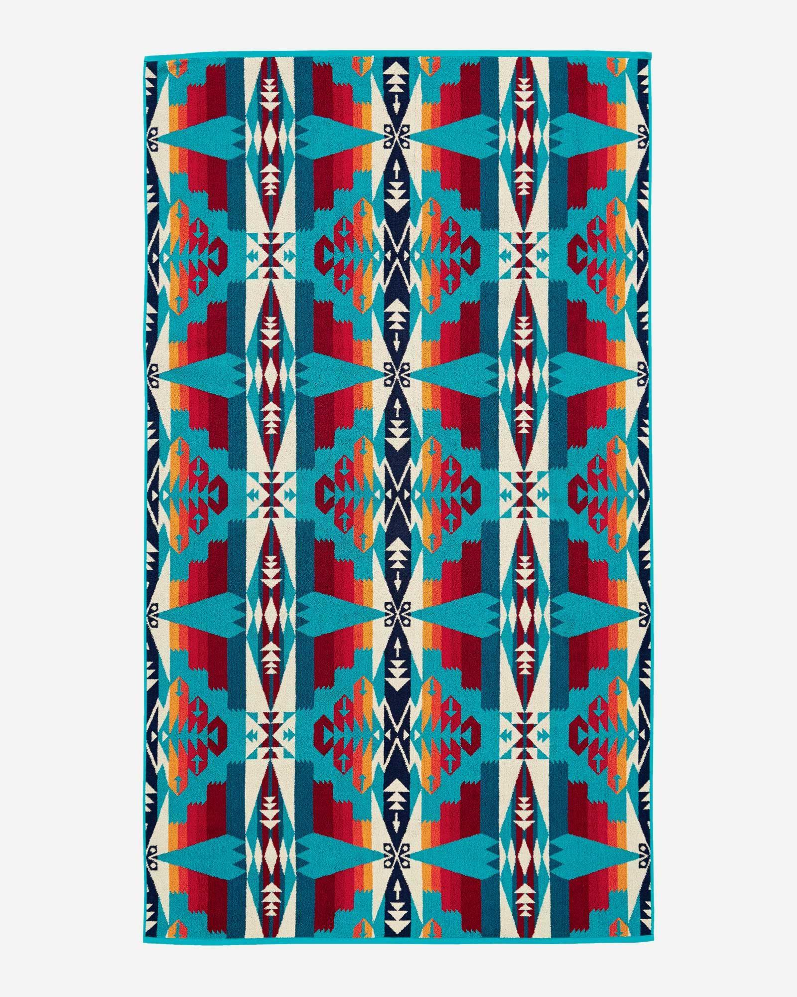 Pendleton Tucson Turquoise Spa & Beach Towel woven from premium cotton velour with vibrant turquoise Southwestern pattern.