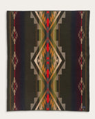 Geometric patterned blanket with a black background